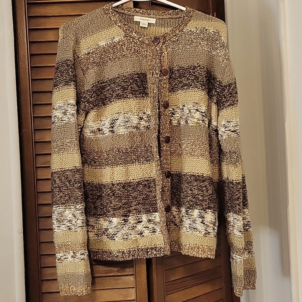 Brown button up sweater.